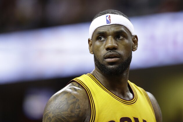 Cleveland Cavaliers forward LeBron James (23) walks up court during a break in play against the Chicago Bulls during the second half of Game 2 in a second-round NBA basketball playoff series Wednesday, May 6, 2015, in Cleveland. (AP Photo/Tony Dejak)