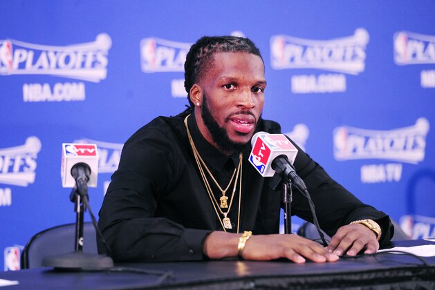 ATLANTA, GEORGIA - MAY 3: DeMarre Carroll #5 of the Atlanta Hawks speaks to the press after the loss against the Washington Wizards for Game One of the Eastern Conference Semifinals during the NBA Playoffs on May 3, 2015 at Philips Center in Atlanta, Georgia.  NOTE TO USER: User expressly acknowledges and agrees that, by downloading and or using this Photograph, user is consenting to the terms and conditions of the Getty Images License Agreement.  Mandatory Copyright Notice: Copyright 2015 NBAE (Photo by Scott Cunningham/NBAE via Getty Images)