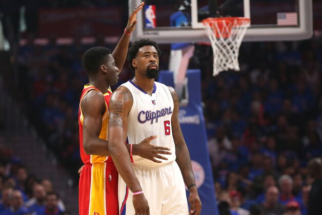 LOS ANGELES, CA - MAY 10:  Clint Capela #15 of the Houston Rockets signals as he intentionally fouls DeAndre Jordan 6 of the Los Angeles Clippers during the first quarter of Game Four of the Western Conference semifinals of the 2015 NBA Playoffs at Staples Center on May 10, 2015 in Los Angeles, California.  NOTE TO USER: User expressly acknowledges and agrees that, by downloading and or using this photograph, User is consenting to the terms and conditions of the Getty Images License Agreement.  (Photo by Stephen Dunn/Getty Images)