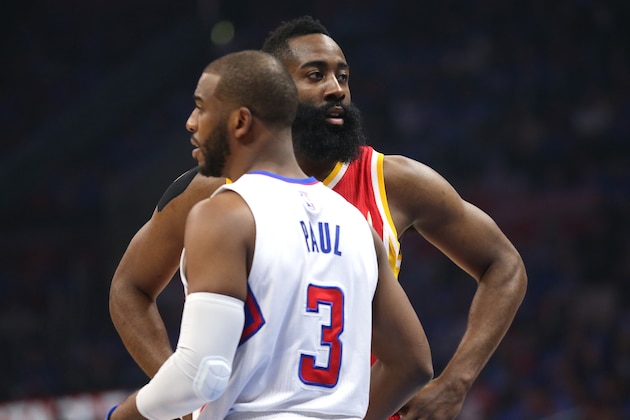 LOS ANGELES, CA - MAY 10: Chris Paul #3 of the Los Angeles Clippers and James Harden #13 of the Houston Rockets wait for play during Game Four of the Western Conference semifinals of the 2015 NBA Playoffs at Staples Center on May 10, 2015 in Los Angeles, California.  NOTE TO USER: User expressly acknowledges and agrees that, by downloading and or using this photograph, User is consenting to the terms and conditions of the Getty Images License Agreement.  (Photo by Stephen Dunn/Getty Images)