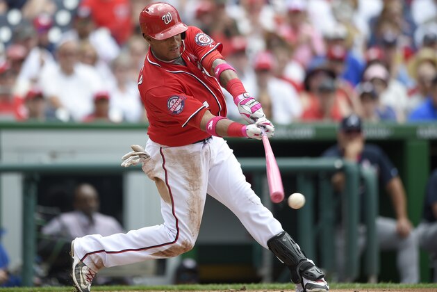 Washington Nationals' Yunel Escobar bats with a pink bat during a baseball game Atlanta Braves, Sunday, May 10, 2015, in Washington. (AP Photo/Nick Wass)