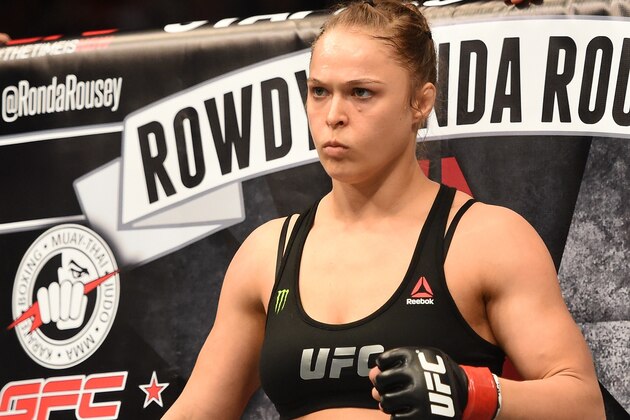 LOS ANGELES, CA - FEBRUARY 28:  Ronda Rousey enters the Octagon in her UFC women's bantamweight championship bout against Cat Zingano during the UFC 184 event at Staples Center on February 28, 2015 in Los Angeles, California.  (Photo by Harry How/Getty Images)