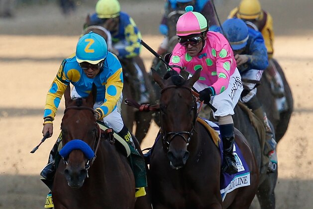 LOUISVILLE, KY - MAY 02:  American Pharoah #18, ridden by Victor Espinoza, races Firing Line #10, ridden by Gary Stevens, down the frontstretch to the finish line during the 141st running of the Kentucky Derby at Churchill Downs on May 2, 2015 in Louisville, Kentucky.  (Photo by Rob Carr/Getty Images)