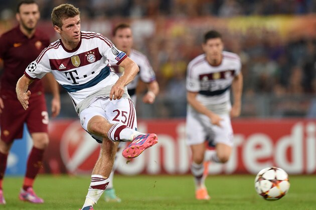 ROME, ITALY - OCTOBER 21:  Thomas Muller of FC Bayern Muenchen  takes the penalty and scores the goal 0-5 during the UEFA Champions League match between AS Roma and FC Bayern Muenchen at Stadio Olimpico on October 21, 2014 in Rome, Italy.  (Photo by Giuseppe Bellini/Getty Images)