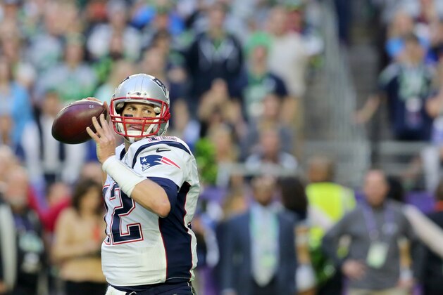 New England Patriots QB Tom Brady #12 in action during NFL Super Bowl XLIX football game against the Seattle Seahawks on Sunday, Feb. 1, 2015, in Glendale, Ariz.  (AP Photo/Gregory Payan)