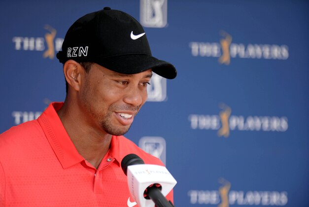 May 10, 2015; Ponte Vedra Beach, FL, USA; Tiger Woods is interviewed after completing the final round of The Players Championship at TPC Sawgrass - Stadium Course. Mandatory Credit: Jake Roth-USA TODAY Sports