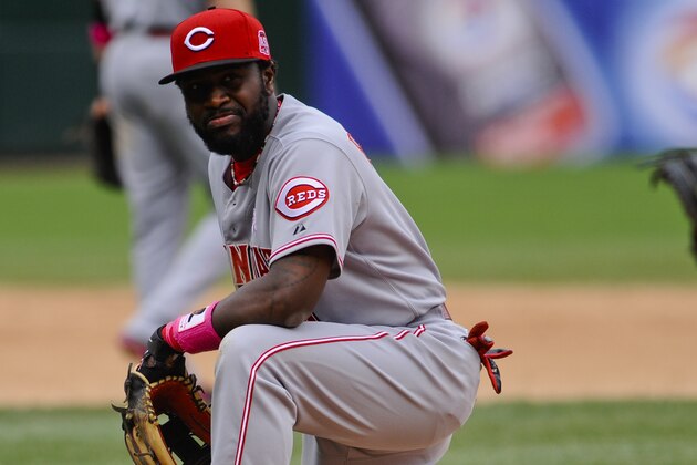 Cincinnati Reds second baseman Brandon Phillips  after Chicago White Sox Micah Johnson scores in the eighth inning of a baseball game in Chicago on Sunday, May 10, 2015.  (AP Photo/Matt Marton)