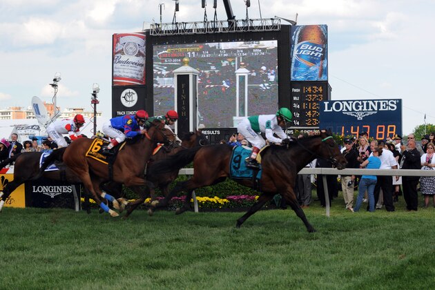 IMAGE DISTRIBUTED FOR LONGINES - Utley, ridden by jockey Edgar Prado, wins the Longines Dixie Stakes, Saturday, May 17, 2014, at Pimlico Race Course in Baltimore, MD. Longines, the Swiss watchmaker known for its famous timepieces, is the Official Watch and Timekeeper of the 139th annual Preakness Stakes and Triple Crown. (Diane Bondareff/Invision for Longines/AP Images)