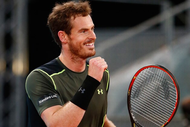 MADRID, SPAIN - MAY 08:  Andy Murray of Great Britain celebrates at match point as he defeated Milos Raonic of Canada in the quarter final during day seven of the Mutua Madrid Open tennis tournament at the Caja Magica on May 8, 2015 in Madrid, Spain.  (Photo by Julian Finney/Getty Images)
