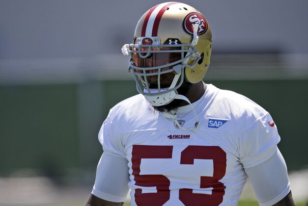 San Francisco 49ers inside linebacker NaVorro Bowman (53) waits for his turn in drills during an NFL football mini-camp Wednesday, April 29, 2015, in Santa Clara, Calif. (AP Photo/Marcio Jose Sanchez)