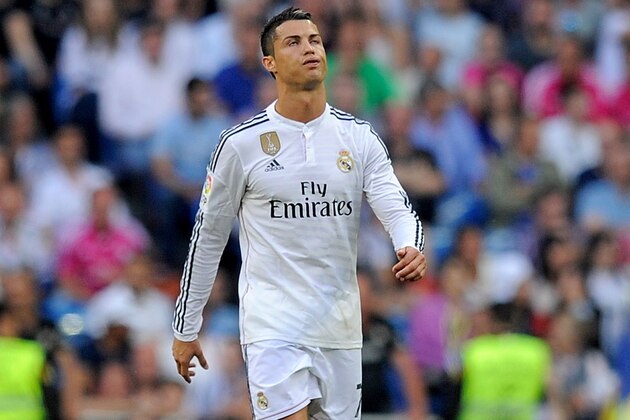 MADRID, SPAIN - MAY 09:  Cristiano Ronaldo of Real Madrid reacts after Valencia CF scored their 2nd goal during  the La Liga match between Real Madrid CF and Valencia CF at Estadio Santiago Bernabeu on May 9, 2015 in Madrid, Spain.  (Photo by Denis Doyle/Getty Images)