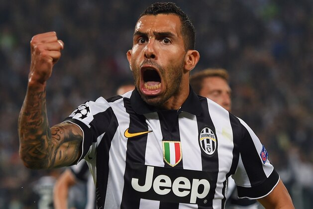 TURIN, ENGLAND - MAY 05:  Carlos Tevez of Juventus celebrates as he scores their second goal from a penalty during the UEFA Champions League semi final first leg match between Juventus and Real Madrid CF at Juventus Arena on May 5, 2015 in Turin, Italy.  (Photo by Michael Regan/Getty Images)