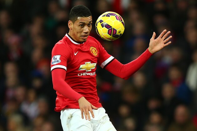 MANCHESTER, ENGLAND - FEBRUARY 28:  Chris Smalling of Manchester United in action during the Barclays Premier League match between Manchester United and Sunderland at Old Trafford on February 28, 2015 in Manchester, England.  (Photo by Clive Brunskill/Getty Images)
