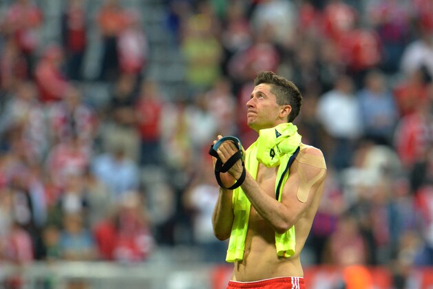 Bayern's Robert Lewandowski reacts after failing to advance to the final after the soccer Champions League second leg semifinal match between Bayern Munich and FC Barcelona at Allianz Arena in Munich, southern Germany, Tuesday, May 12, 2015. (AP Photo/Kerstin Joensson)
