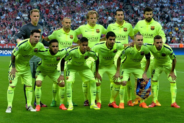 Barcelona players pose for a photo prior the soccer Champions League second leg semifinal match between Bayern Munich and FC Barcelona at Allianz Arena in Munich, southern Germany, Tuesday, May 12, 2015. (AP Photo/Kerstin Joensson)