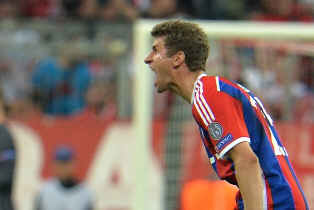 Bayern's Thomas Mueller reacts during the soccer Champions League second leg semifinal match between Bayern Munich and FC Barcelona at Allianz Arena in Munich, southern Germany, Tuesday, May 12, 2015. (AP Photo/Kerstin Joensson)