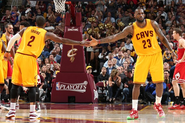 CLEVELAND, OH - MAY 12: Kyrie Irving #2 and LeBron James #23 of the Cleveland Cavaliers during the game against the Chicago Bulls in Game Five of the Eastern Conference Semifinals of the NBA Playoffs at The Quicken Loans Arena on May 12, 2015 in Cleveland, Ohio. NOTE TO USER: User expressly acknowledges and agrees that, by downloading and/or using this Photograph, user is consenting to the terms and conditions of the Getty Images License Agreement. Mandatory Copyright Notice: Copyright 2015 NBAE (Photo by Nathaniel S. Butler/NBAE via Getty Images)