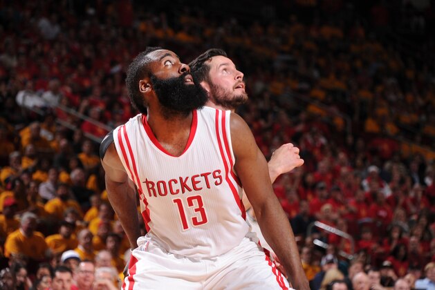 HOUSTON, TX - MAY 12: James Harden #13 of the Houston Rockets looks for the rebound against J.J. Redick #4 of the Los Angeles Clippers during Game Five of the Western Conference Semifinals during the NBA Playoffs on May 12, 2015 at Toyota Center in Houston, Texas.  NOTE TO USER: User expressly acknowledges and agrees that, by downloading and or using this Photograph, user is consenting to the terms and conditions of the Getty Images License Agreement.  Mandatory Copyright Notice: Copyright 2015 NBAE (Photo by Bill Baptist/NBAE via Getty Images)