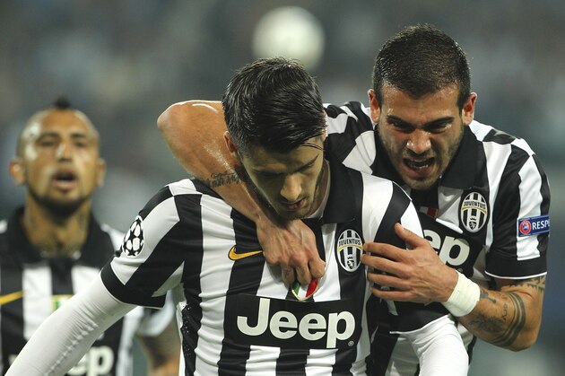 TURIN, ITALY - MAY 05:  Alvaro Morata of Juventus FC celebrates with his team-mate Stefano Sturaro after scoring the opening goal during the UEFA Champions League semi final match between Juventus and Real Madrid CF at Juventus Arena on May 5, 2015 in Turin, Italy.  (Photo by Marco Luzzani/Getty Images)