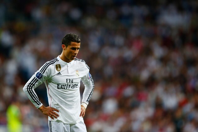 MADRID, SPAIN - APRIL 22:  Cristiano Ronaldo of Real Madrid CF looks thoughtful during the UEFA Champions League quarter-final second leg match between Real Madrid CF and Club Atletico de Madrid at Bernabeu on April 22, 2015 in Madrid, Spain.  (Photo by Clive Rose/Getty Images)