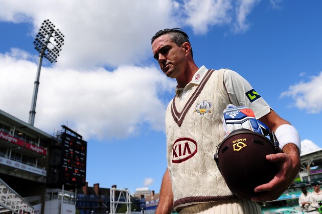 LONDON, ENGLAND - MAY 12:  Kevin Pietersen of Surrey leaves the field at the end of the Surrey innings on 355 not out during day three of the LV County Championship match between Surrey and Leicestershire at The Kia Oval on May 12, 2015 in London, England.  (Photo by Dan Mullan/Getty Images)