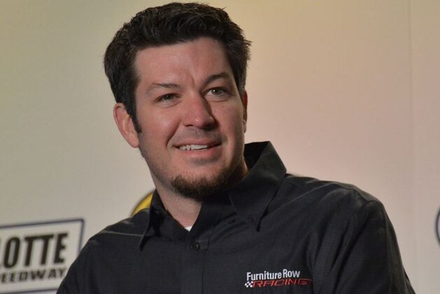 Martin Truex Jr. waits for media questions in Charlotte.