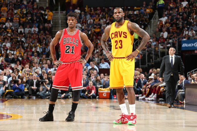 CLEVELAND, OH - MAY 12:  Jimmy Butler #21 of the Chicago Bulls and LeBron James #23 of the Cleveland Cavaliers in Game Five of the Eastern Conference Semifinals of the NBA Playoffs at The Quicken Loans Arena on May 12, 2015 in Cleveland, Ohio. NOTE TO USER: User expressly acknowledges and agrees that, by downloading and/or using this Photograph, user is consenting to the terms and conditions of the Getty Images License Agreement. Mandatory Copyright Notice: Copyright 2015 NBAE (Photo by Nathaniel S. Butler/NBAE via Getty Images)