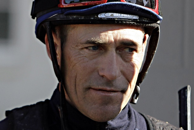 Jockey Gary Stevens, who is scheduled to ride Kentucky Derby hopeful Candy Boy in race, talks about the colt after a morning workout at Churchill Downs in Louisville, Ky., Saturday, April 26, 2014.  (AP Photo/Garry Jones)
