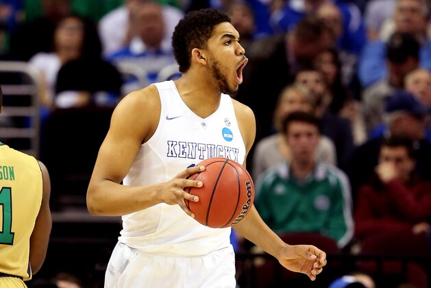 CLEVELAND, OH - MARCH 28: Karl-Anthony Towns #12 of the Kentucky Wildcats reacts after being called for a foul in the second half against the Notre Dame Fighting Irish during the Midwest Regional Final of the 2015 NCAA Men's Basketball tournament at Quicken Loans Arena on March 28, 2015 in Cleveland, Ohio.  (Photo by Andy Lyons/Getty Images)