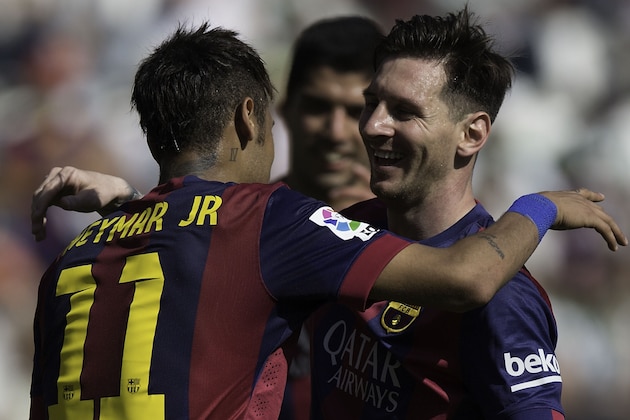 CORDOBA, SPAIN - MAY 02: Neymar JR. (L) of FC Barcelona celebrates scoring their seventh goal with teammate Lionel Messi (R) during the La Liga match between Cordoba CF and Barcelona FC at El Arcangel stadium on May 2, 2015 in Cordoba, Spain.  (Photo by Gonzalo Arroyo Moreno/Getty Images)