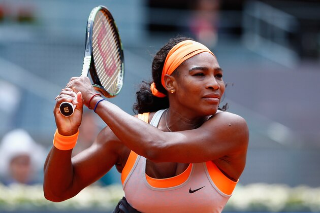 MADRID, SPAIN - MAY 08:  Serena Williams of USA plays a backhand in her match against Petra Kvitova of Czech Republic during day seven of the Mutua Madrid Open tennis tournament at the Caja Magica on May 8, 2015 in Madrid, Spain.  (Photo by Julian Finney/Getty Images)