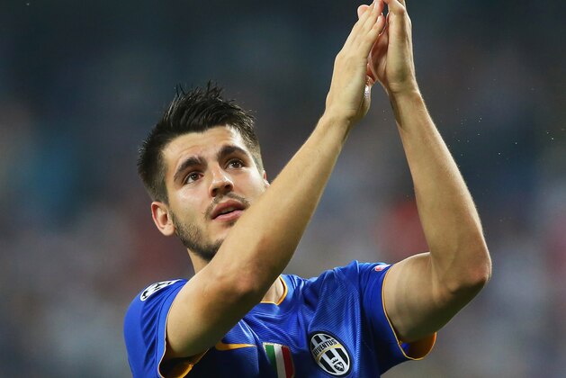 MADRID, SPAIN - MAY 13:  Alvaro Morata of Juventus applauds the fans following his team's progression to the final during the UEFA Champions League Semi Final, second leg match between Real Madrid and Juventus at Estadio Santiago Bernabeu on May 13, 2015 in Madrid, Spain.  (Photo by Alex Livesey/Getty Images)