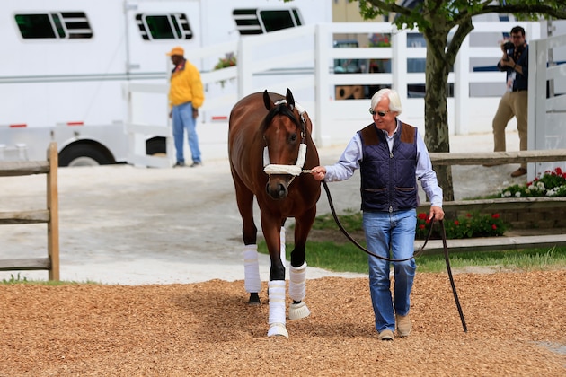 BALTIMORE, MD - MAY 13: Trainer Bob Baffert walks Kentucky Derby winner American Pharoah to the barn after arriving in preparation for the 140th Preakness Stakes at Pimlico Race Course on May 13, 2015 in Baltimore, Maryland. (Photo by Rob Carr/Getty Images) BALTIMORE, MD - MAY 13: Trainer Bob Baffert walks Kentucky Derby winner American Pharoah to the barn after arriving in preparation for the 140th Preakness Stakes at Pimlico Race Course on May 13, 2015 in Baltimore, Maryland. (Photo by Rob Carr/Getty Images)