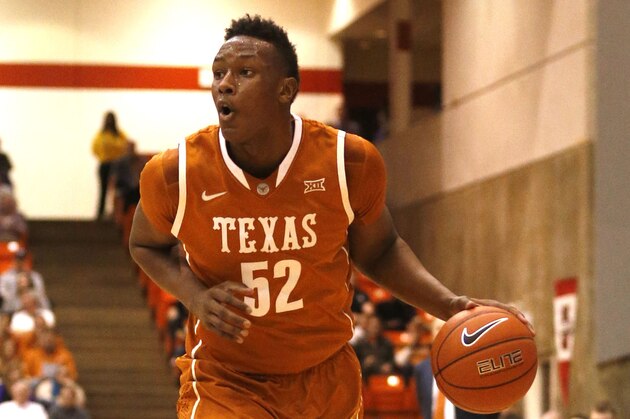 Jan 19, 2015; Fort Worth, TX, USA; Texas Longhorns forward Myles Turner (52) dribbles the ball against the TCU Horned Frogs in the first half at Wilkerson-Greines Athletic Center. Texas beat  TCU 66-48. Mandatory Credit: Tim Heitman-USA TODAY Sports