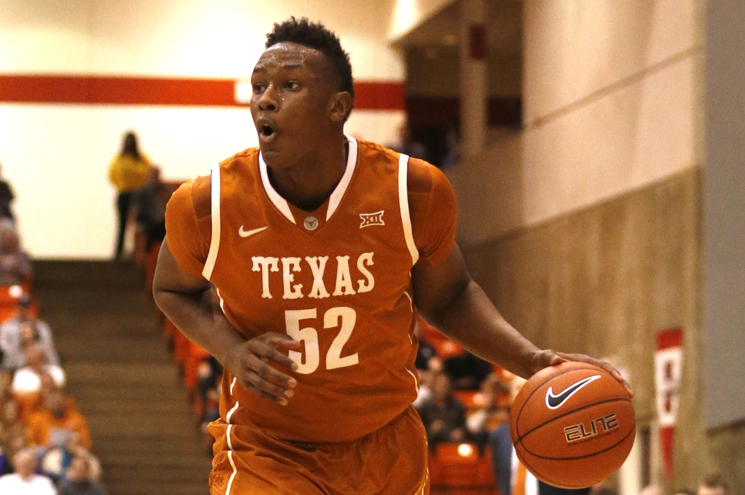 Jan 19, 2015; Fort Worth, TX, USA; Texas Longhorns forward Myles Turner (52) dribbles the ball against the TCU Horned Frogs in the first half at Wilkerson-Greines Athletic Center. Texas beat  TCU 66-48. Mandatory Credit: Tim Heitman-USA TODAY Sports