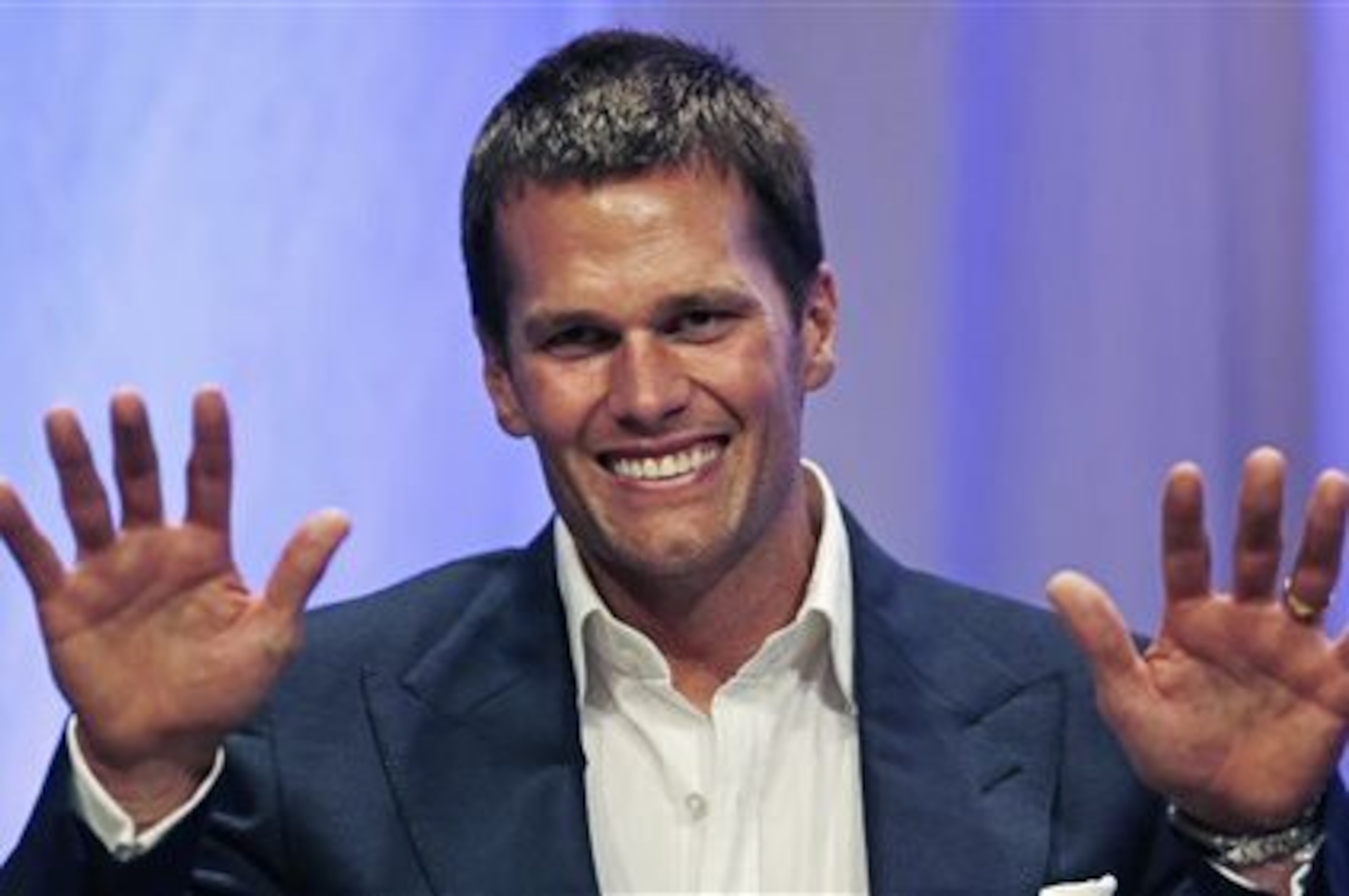 New England Patriots quarterback Tom Brady gestures during an event at Salem State University in Salem, Mass., Thursday, May 7, 2015. An NFL investigation has found that New England Patriots employees likely deflated footballs and that quarterback Tom Brady was New England Patriots quarterback Tom Brady gestures during an event at Salem State University in Salem, Mass., Thursday, May 7, 2015. An NFL investigation has found that New England Patriots employees likely deflated footballs and that quarterback Tom Brady was
