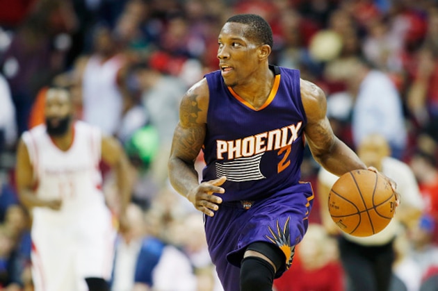 HOUSTON, TX - MARCH 21:  Eric Bledsoe #2 of the Phoenix Suns takes the basketball upcourt as James Harden #13 of the Houston Rockets looks on during their game at the Toyota Center on March 21, 2015 in Houston, Texas. NOTE TO USER: User expressly acknowledges and agrees that, by downloading and/or using this photograph, user is consenting to the terms and conditions of the Getty Images License Agreement.  (Photo by Scott Halleran/Getty Images)