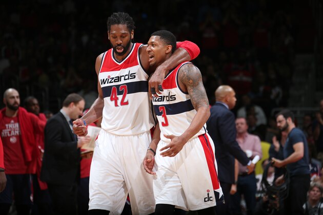 WASHINGTON, DC - MAY 11:  Nene Hilario #42 of the Washington Wizards talks with teammate Bradley Beal #3 in Game Four of the Eastern Conference Semifinals against the Atlanta Hawks during the 2015 NBA Playoffs on May 11, 2015 at the Verizon Center in Washington, DC. NOTE TO USER: User expressly acknowledges and agrees that, by downloading and or using this Photograph, user is consenting to the terms and conditions of the Getty Images License Agreement. Mandatory Copyright Notice: Copyright 2015 NBAE (Photo by Ned Dishman/NBAE via Getty Images)