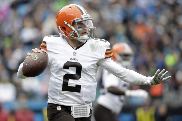 FILE - In this Sunday, Dec. 21, 2014 file photo, Cleveland Browns' Johnny Manziel (2) looks to pass against the Carolina Panthers in the first half of an NFL football game in Charlotte, N.C. Browns coach Mike Pettine expects quarterback Johnny Manziel to take part in the team's practices next month after leaving rehab, Tuesday, March 24, 2015. (AP Photo/Bob Leverone, File)