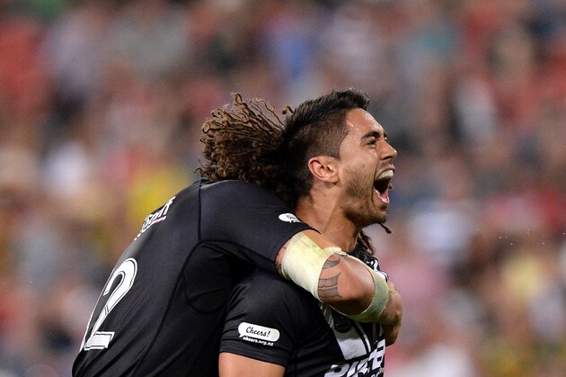 BRISBANE, AUSTRALIA - OCTOBER 25: Shaun Johnson of New Zealand celebrates scoring a try during the Four Nations Rugby League match between the Australian Kangaroos and New Zealand Kiwis at Suncorp Stadium on October 25, 2014 in Brisbane, Australia.  (Photo by Bradley Kanaris/Getty Images)