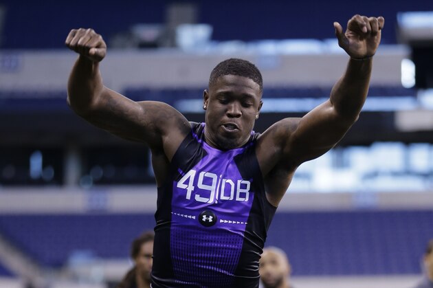 Samford defensive back Jaquiski Tartt runs a drill at the NFL football scouting combine in Indianapolis, Monday, Feb. 23, 2015. (AP Photo/Julio Cortez)