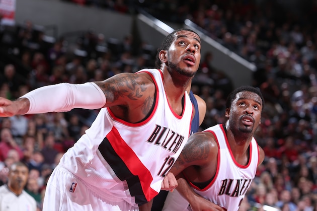 PORTLAND, OR - NOVEMBER 17: LaMarcus Aldridge #12 and Wesley Matthews #2 of the Portland Trail Blazers battle for position against the New Orleans Pelicans on November 17, 2014 at the Moda Center Arena in Portland, Oregon. NOTE TO USER: User expressly acknowledges and agrees that, by downloading and or using this photograph, user is consenting to the terms and conditions of the Getty Images License Agreement. Mandatory Copyright Notice: Copyright 2014 NBAE (Photo by Sam Forencich/NBAE via Getty Images)