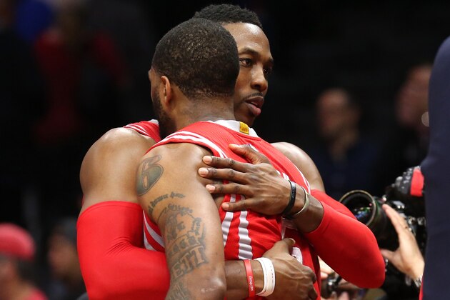LOS ANGELES, CA - MAY 14:  Dwight Howard #12 and Josh Smith #5 of of he Houston Rockets embrace after defeating the Los Angeles Clippers during Game Six of the Western Conference semifinals of the 2015 NBA Playoffs at Staples Center on May 14, 2015 in Los Angeles, California.  The Rockets won 119-107.   NOTE TO USER: User expressly acknowledges and agrees that, by downloading and or using this photograph, User is consenting to the terms and conditions of the Getty Images License Agreement.  (Photo by Stephen Dunn/Getty Images)