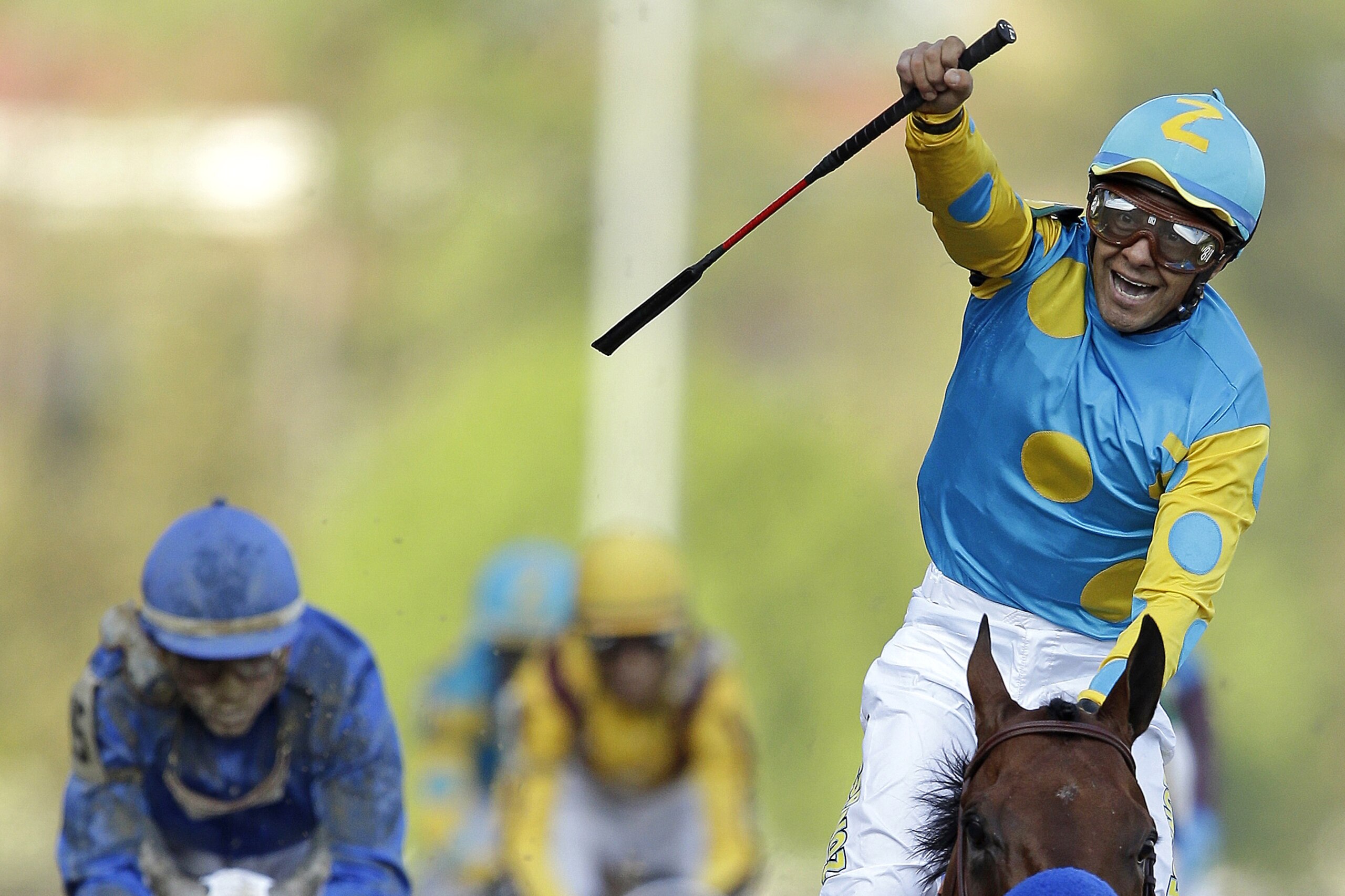 FILE - In this Saturday, May 2, 2015, file photo, jockey Victor Espinoza celebrate atop American Pharoah after they won the Kentucky Derby horse race at Churchill Downs in Louisville, Ky. Like almost every Kentucky Derby winner before him, American Pharoah is facing the inevitable question of whether he can win the Triple Crown. It hasn't been done since 1978, and with him and third-place Dortmund both trained by Hall of Famer Bob Baffert, it'll be interesting to see what happens at the Preakness. (AP Photo/Darron Cummings, File)
