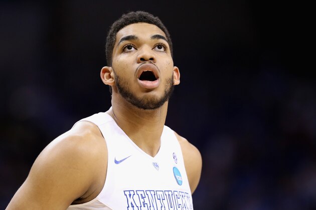 LOUISVILLE, KY - MARCH 21:  Karl-Anthony Towns #12 of the Kentucky Wildcats watches on against the Cincinnati Bearcats during the third round of the 2015 NCAA Men's Basketball Tournament at KFC YUM! Center on March 21, 2015 in Louisville, Kentucky.  (Photo by Andy Lyons/Getty Images)