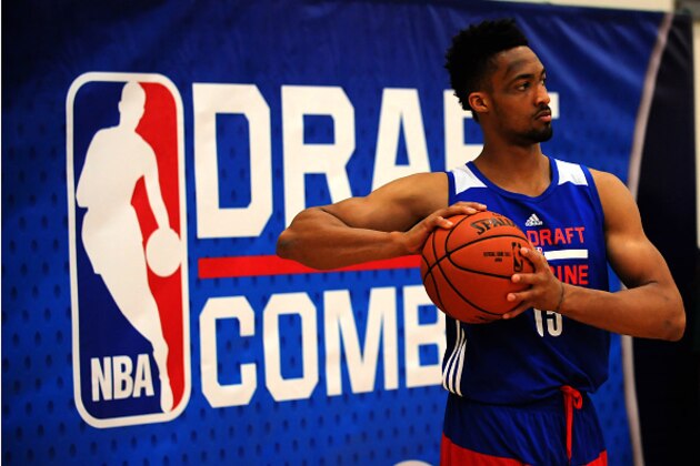 CHICAGO, IL - MAY 14: J.P. Tokoto #15 stretches during the 2015 NBA Draft Combine on May 14, 2015 at Quest Multiplex in Chicago, Illinois. NOTE TO USER: User expressly acknowledges and agrees that, by downloading and/or using this photograph, user is consenting to the terms and conditions of the Getty Images License Agreement. Mandatory Copyright Notice: Copyright 2013 NBAE (Photo by Randy Belice/NBAE via Getty Images) CHICAGO, IL - MAY 14: J.P. Tokoto #15 stretches during the 2015 NBA Draft Combine on May 14, 2015 at Quest Multiplex in Chicago, Illinois. NOTE TO USER: User expressly acknowledges and agrees that, by downloading and/or using this photograph, user is consenting to the terms and conditions of the Getty Images License Agreement. Mandatory Copyright Notice: Copyright 2013 NBAE (Photo by Randy Belice/NBAE via Getty Images)
