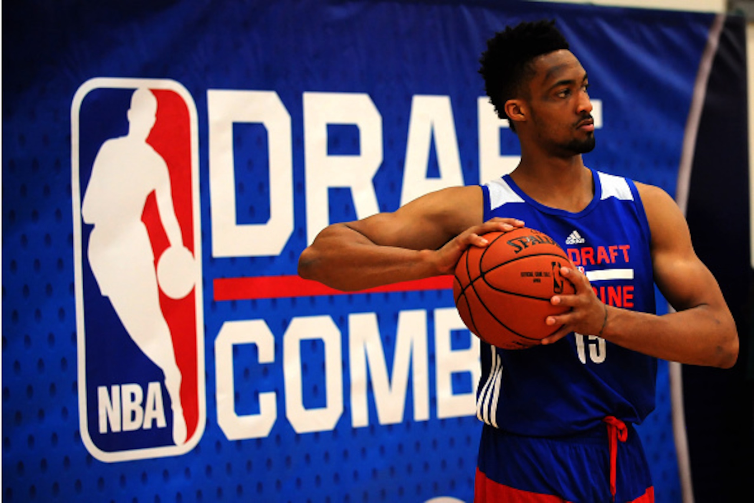 CHICAGO, IL - MAY 14: J.P. Tokoto #15 stretches during the 2015 NBA Draft Combine on May 14, 2015 at Quest Multiplex in Chicago, Illinois. NOTE TO USER: User expressly acknowledges and agrees that, by downloading and/or using this photograph, user is consenting to the terms and conditions of the Getty Images License Agreement. Mandatory Copyright Notice: Copyright 2013 NBAE (Photo by Randy Belice/NBAE via Getty Images) CHICAGO, IL - MAY 14: J.P. Tokoto #15 stretches during the 2015 NBA Draft Combine on May 14, 2015 at Quest Multiplex in Chicago, Illinois. NOTE TO USER: User expressly acknowledges and agrees that, by downloading and/or using this photograph, user is consenting to the terms and conditions of the Getty Images License Agreement. Mandatory Copyright Notice: Copyright 2013 NBAE (Photo by Randy Belice/NBAE via Getty Images)