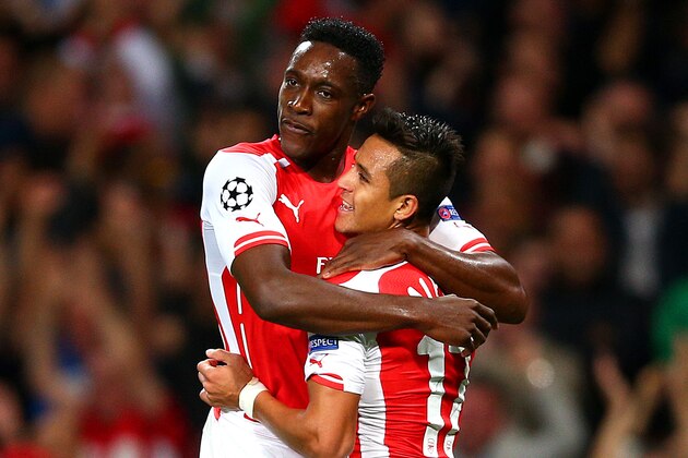 LONDON, ENGLAND - OCTOBER 01:  Danny Welbeck of Arsenal celebrates with team-mate Alexis Sanchez after scoring the opening goal during the UEFA Champions League group D match between Arsenal FC and Galatasaray AS at Emirates Stadium on October 1, 2014 in London, United Kingdom.  (Photo by Paul Gilham/Getty Images)