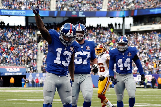 EAST RUTHERFORD, NJ - DECEMBER 14:  Odell Beckham Jr. #13 of the New York Giants celebrates after scoring 10 yard touchdown thrown by Eli Manning #10 in the first quarter against the Washington Redskins during their game at MetLife Stadium on December 14, 2014 in East Rutherford, New Jersey.  (Photo by Jeff Zelevansky/Getty Images)