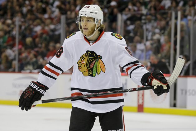Chicago Blackhawks right wing Patrick Kane (88) gets into position for a face-off against the Minnesota Wild during the second period of Game 3 in the second round of the NHL Stanley Cup hockey playoffs in St. Paul, Minn., Tuesday, May 5, 2015. (AP Photo/Ann Heisenfelt)